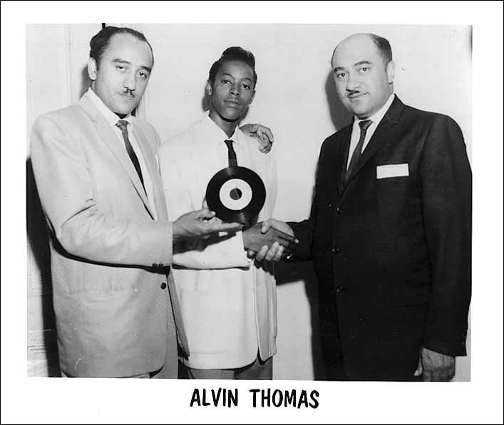 Brad Taylor and brother Victor with Alvin Thomas